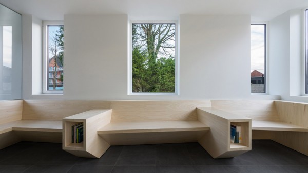 Joshua Florquin uses angular joinery to create bespoke furnishings for doctor's surgery in Maldegem, Belgium