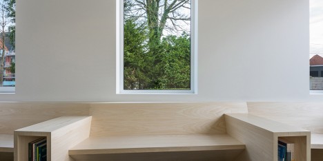 Joshua Florquin uses angular joinery to create bespoke furnishings for doctor's surgery in Maldegem, Belgium