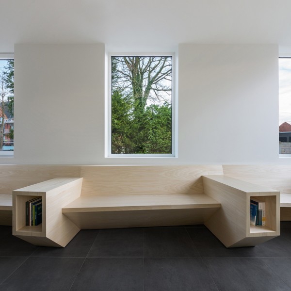 Joshua Florquin uses angular joinery to create bespoke furnishings for doctor's surgery in Maldegem, Belgium