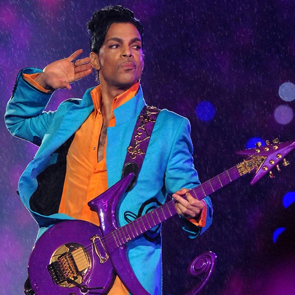 Prince with "love symbol" guitar