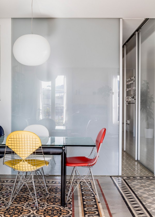 Barcelona apartment renovation by Narch revealing mosaic floors