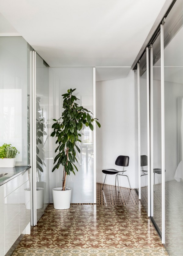Barcelona apartment renovation by Narch revealing mosaic floors