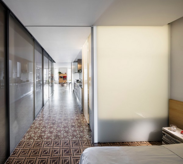 Barcelona apartment renovation by Narch revealing mosaic floors