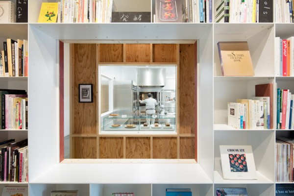 Hue Plus kitchen studio and library housed in a renovated warehouse building in Tokyo, Japan by Schemata Architects