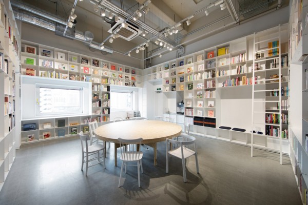 Hue Plus kitchen studio and library housed in a renovated warehouse building in Tokyo, Japan by Schemata Architects