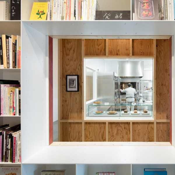Hue Plus kitchen studio and library housed in a renovated warehouse building in Tokyo, Japan by Schemata Architects