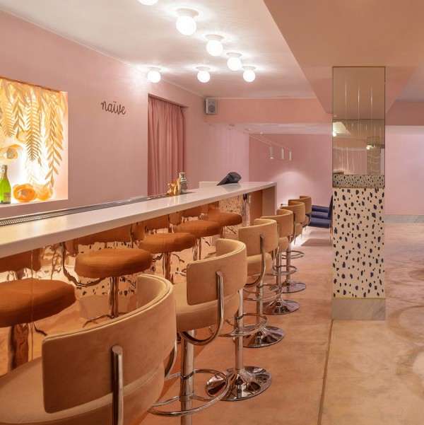 AKZ Architectura designs soft pink interior for champagne bar in Kyiv