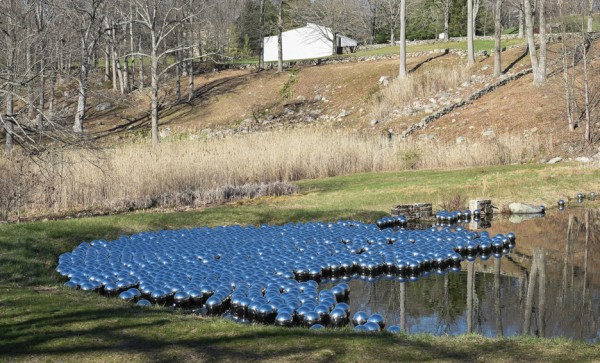 Narcissus Garden sculpture of mirrored spheres by Yayoi Kusama installed at Philip Johnson's Glass House in Connecticut