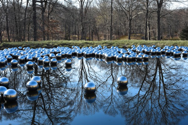 Narcissus Garden sculpture of mirrored spheres by Yayoi Kusama installed at Philip Johnson's Glass House in Connecticut