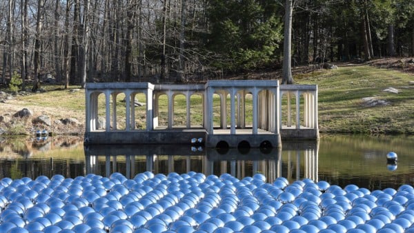 Narcissus Garden sculpture of mirrored spheres by Yayoi Kusama installed at Philip Johnson's Glass House in Connecticut