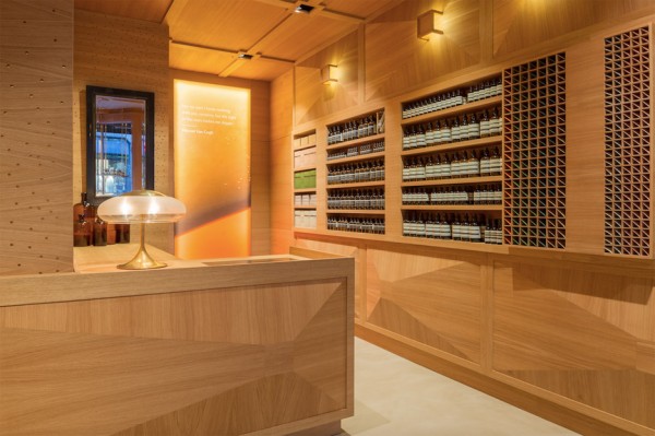 Aesop store in Oslo designed by Snøhetta covered with three dimensional oak panels