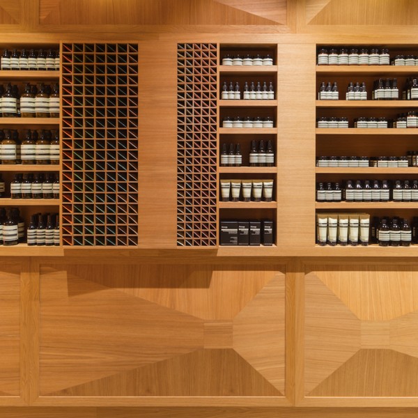 Aesop store in Oslo designed by Snøhetta covered with three dimensional oak panels