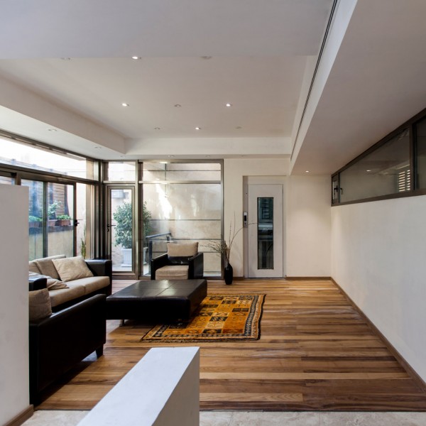 Bagh-Janat residential architecture with timber and travertine cladding in Isfahan Iran by Bracket Design Studio