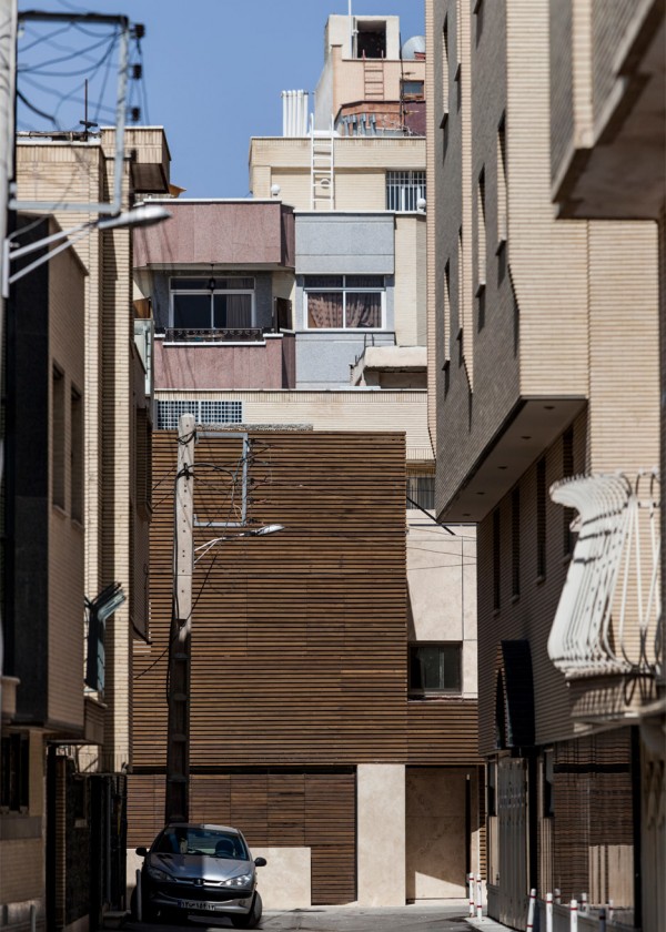 Bagh-Janat residential architecture with timber and travertine cladding in Isfahan Iran by Bracket Design Studio