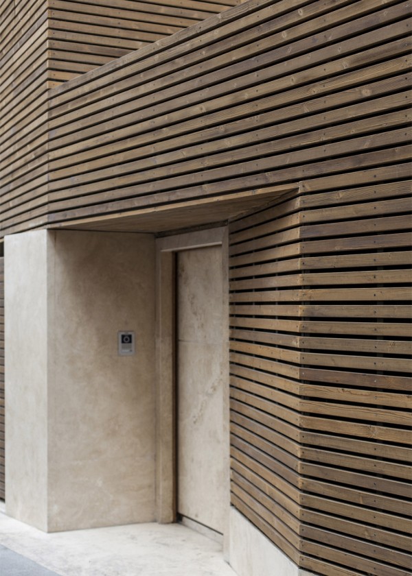 Bagh-Janat residential architecture with timber and travertine cladding in Isfahan Iran by Bracket Design Studio