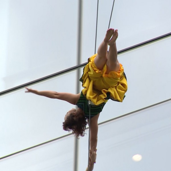 Mid-air dancing performance on the side of 100 North Avenue in Boston, Massachusetts, USA by Bandaloop