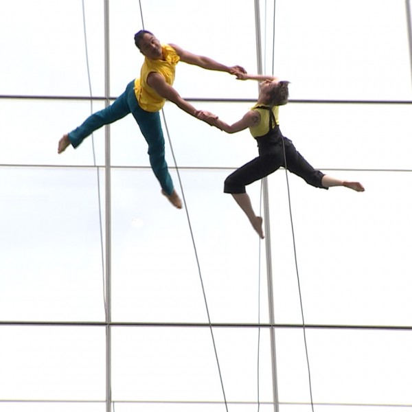 Mid-air dancing performance on the side of 100 North Avenue in Boston, Massachusetts, USA by Bandaloop