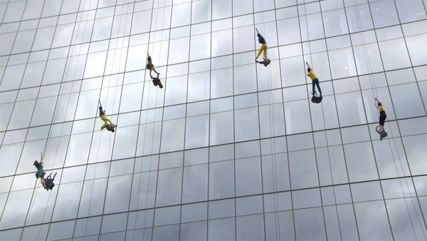 Mid-air dancing performance on the side of 100 North Avenue in Boston, Massachusetts, USA by Bandaloop