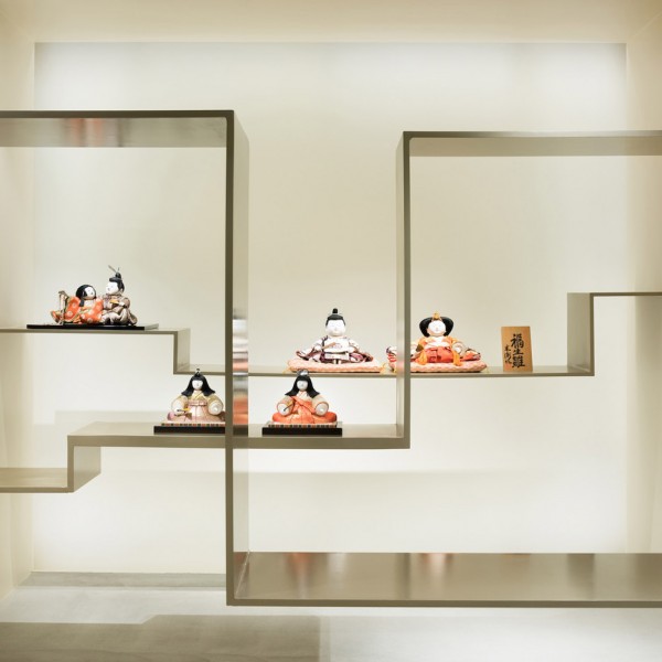 Sasaki Architecture and Atelier O design minimal gallery space for traditional porcelain dolls