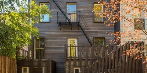 Architensions clads rear facade of historic Brooklyn townhouse in charred wood