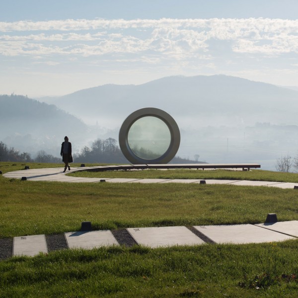 NFO designs giant broken camera lens to honour photojournalist killed in Yugoslav Wars