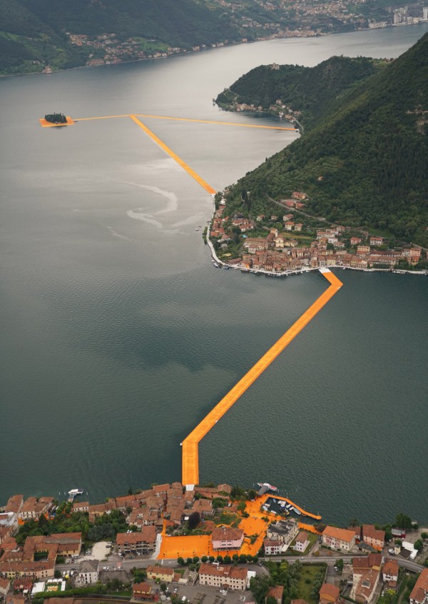 The Floating Piers project by Christo features bright orange pathways across Italy's Lake Iseo