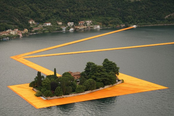 The Floating Piers project by Christo features bright orange pathways across Italy's Lake Iseo