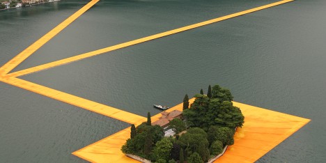 The Floating Piers project by Christo features bright orange pathways across Italy's Lake Iseo