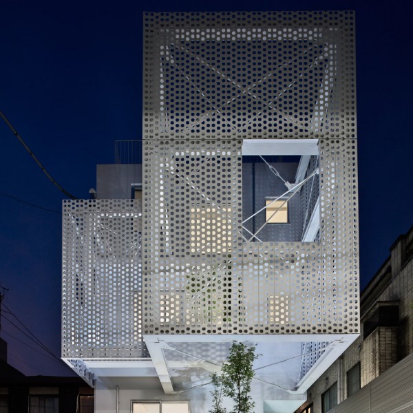 Hiroyuki Moriyama completes Tokyo apartment building with a perforated skin