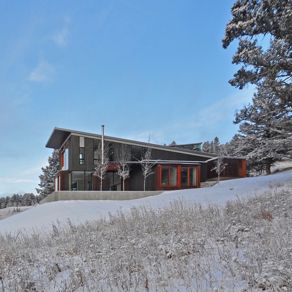 The Mountain House in Montana by Johnsen Schmaling Architects is clad with charred wood