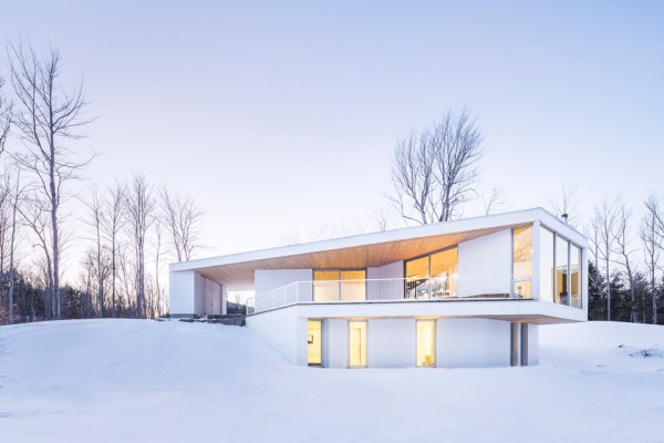Nook Residence by MU Architecture, a white house in Quebec, Canada
