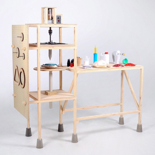 Spirograph Lab by Shawn Yang is a machine that allows the 2D spirograph pattern to become 3D