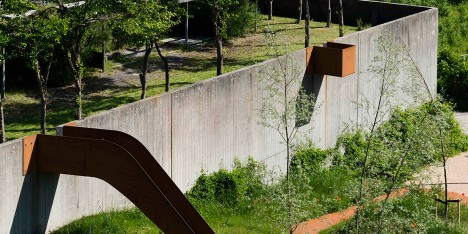 Holscher Nordberg Architects creates play area framed by a single metal ribbon