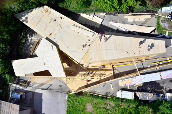Bilding is a faceted wooden community centre built by students