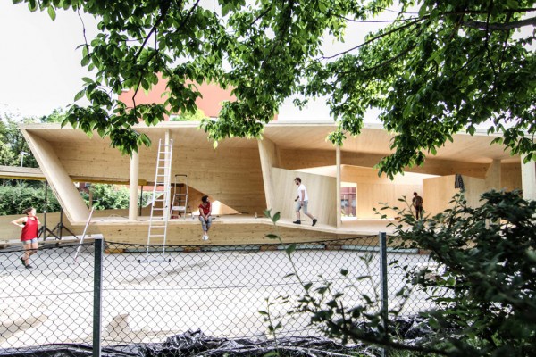 Bilding is a faceted wooden community centre built by students