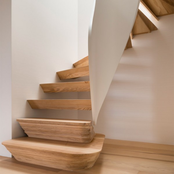 Twisted staircase features in Casa Vota renovation by 51 Architecture