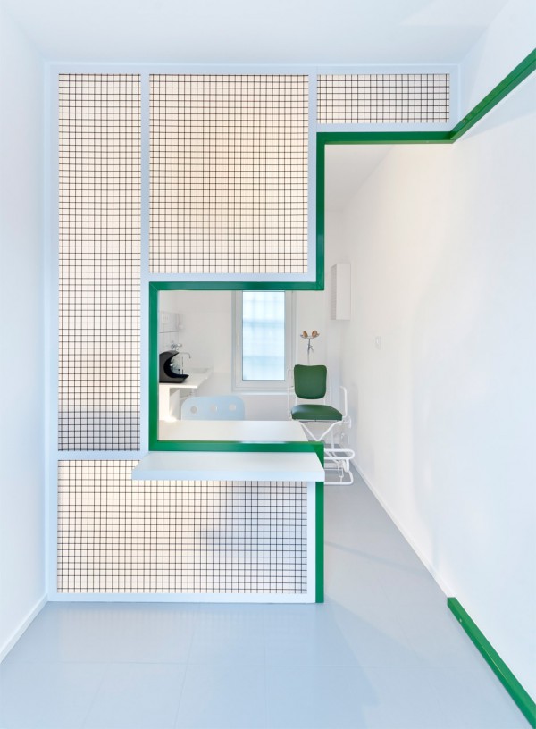Adam Wiercinski creates denture clinic with green cross interior for Dent Protetyka