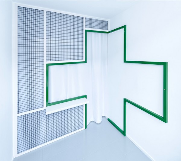 Adam Wiercinski creates denture clinic with green cross interior for Dent Protetyka