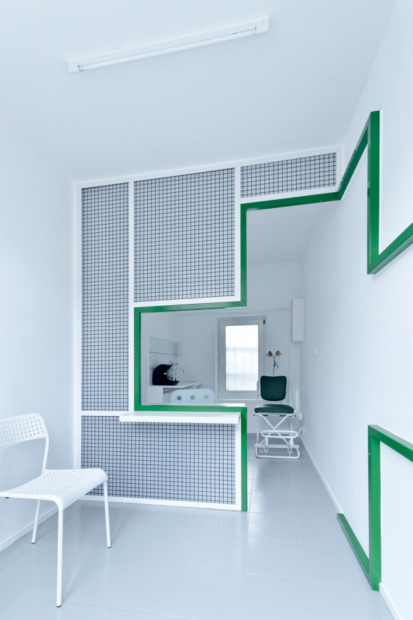 Adam Wiercinski creates denture clinic with green cross interior for Dent Protetyka