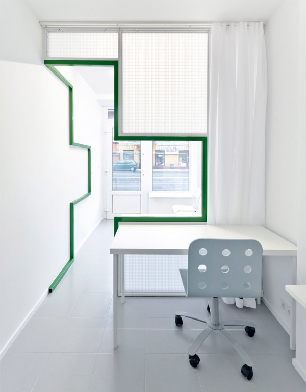 Adam Wiercinski creates denture clinic with green cross interior for Dent Protetyka