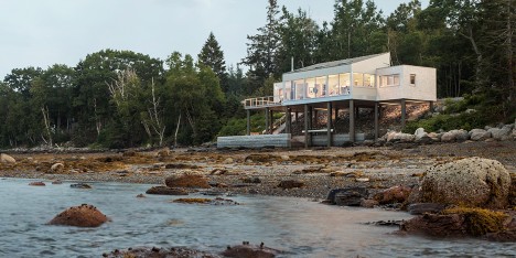 House over the sea by Elliott + Elliott