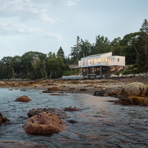 House over the sea by Elliott + Elliott