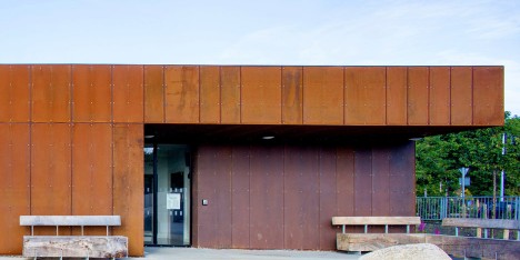 ABK updates 1960s leisure centre with new Corten-steel facade