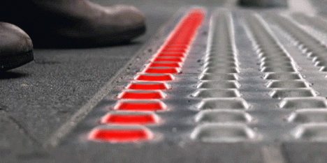 Büro North proposes traffic lights in the pavement to prevent accidents involving smartphone uses