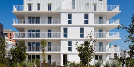 Gabled penthouses sit atop apartment blocks at Bordeaux housing scheme