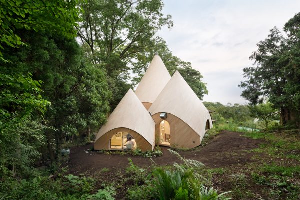Teepee-shaped Jikka complex by Issei Suma features community kitchen and spiral-shaped pool