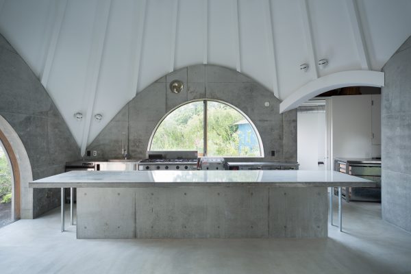 Teepee-shaped Jikka complex by Issei Suma features community kitchen and spiral-shaped pool