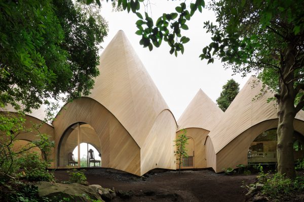 Teepee-shaped Jikka complex by Issei Suma features community kitchen and spiral-shaped pool