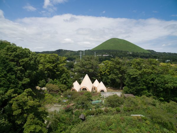 Teepee-shaped Jikka complex by Issei Suma features community kitchen and spiral-shaped pool