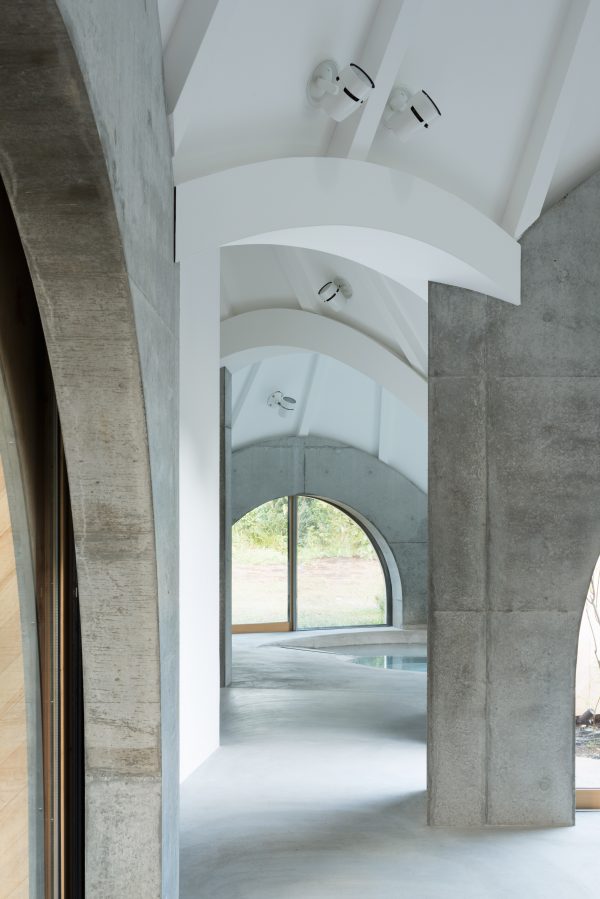 Teepee-shaped Jikka complex by Issei Suma features community kitchen and spiral-shaped pool